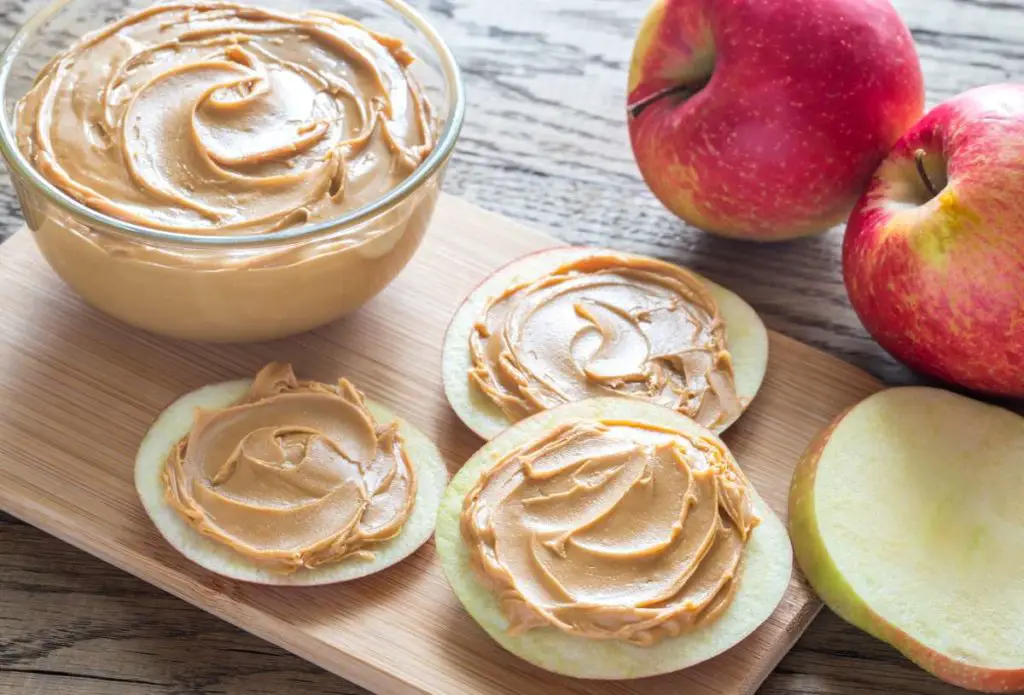 sliced apples with nut butter